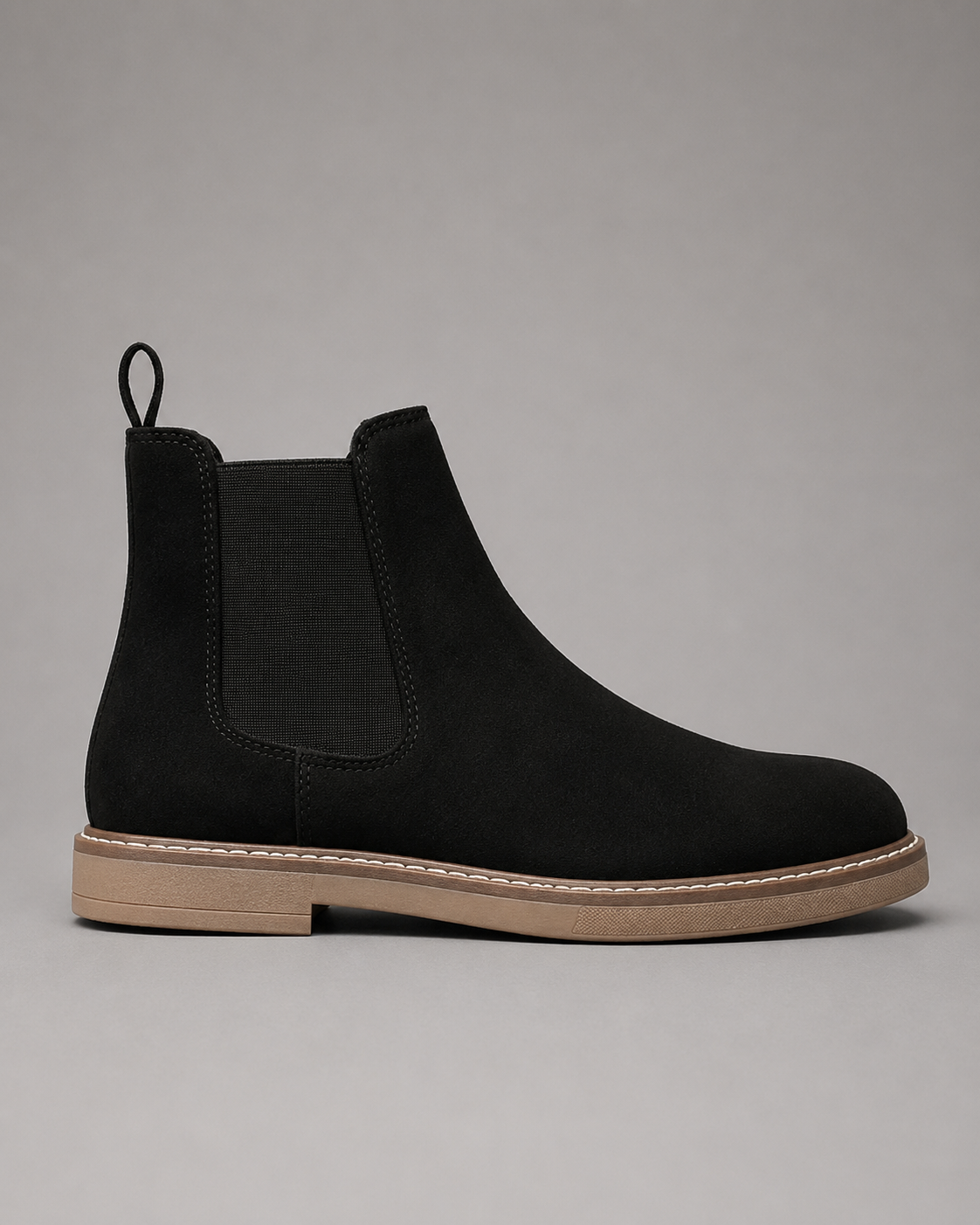 Side profile of Black Chelsea Boots for Men with suede upper and beige rubber sole
