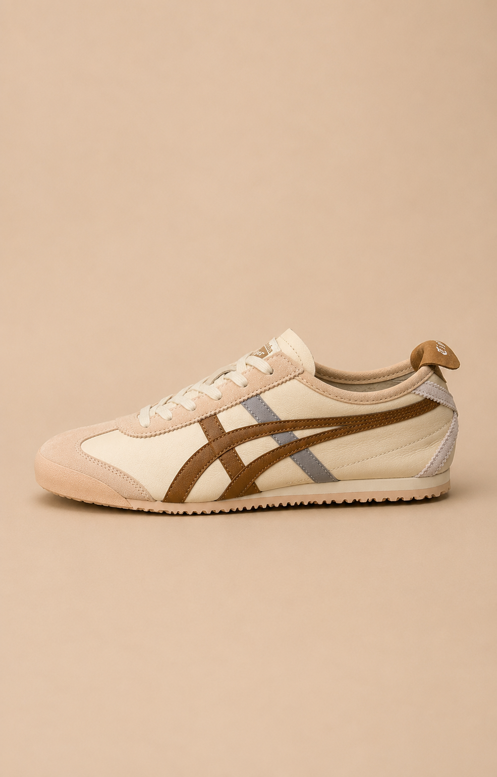 Side profile of Onitsuka Tiger Mexico 66 Cream Brown sneaker with beige leather upper and brown stripes